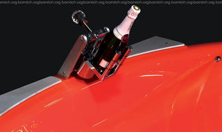 Illustration for article titled Gold-Framed, Dual-HDTV-Wielding, GSM-Controlled Bathtub Won't Get You Any Cleaner